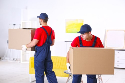 Customers moving items safely inside a self storage facility