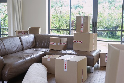 Local packing team organising fragile items for transport in Paddington